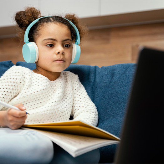 young student attending online class