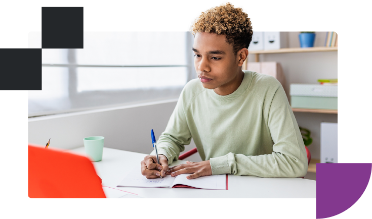 young student doing his homework